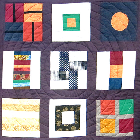 Quilt using modern Block of the Month patterns